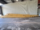 Żółte 35m długości wykopalnika dla Sanny Hitachi Kobelco